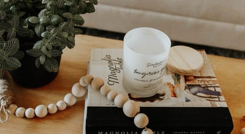 white ceramic mug on brown wooden table