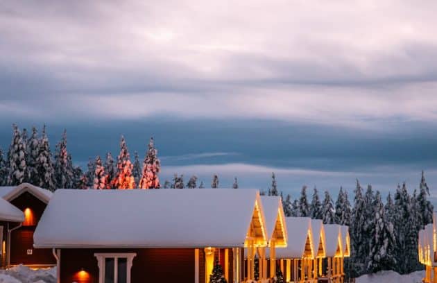 a house with a lot of snow on the ground