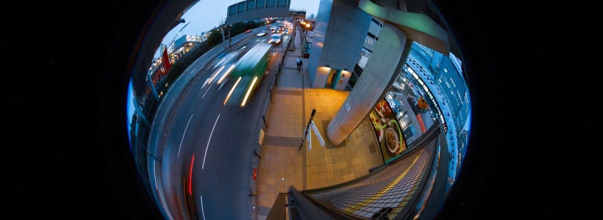 a fish eye view of a city street at night