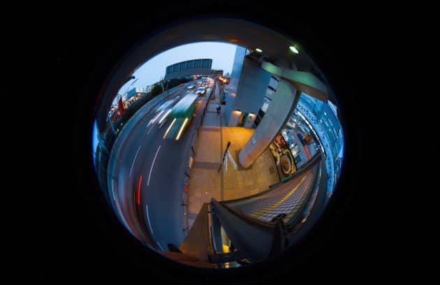 a fish eye view of a city street at night