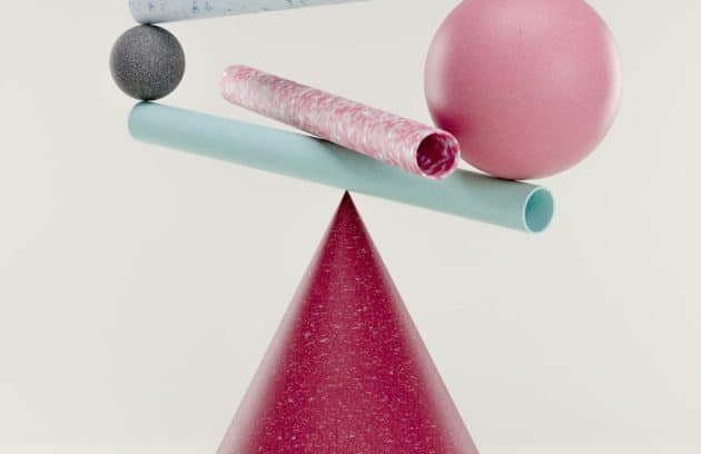 a pink cone with two balls and a ball on top of it