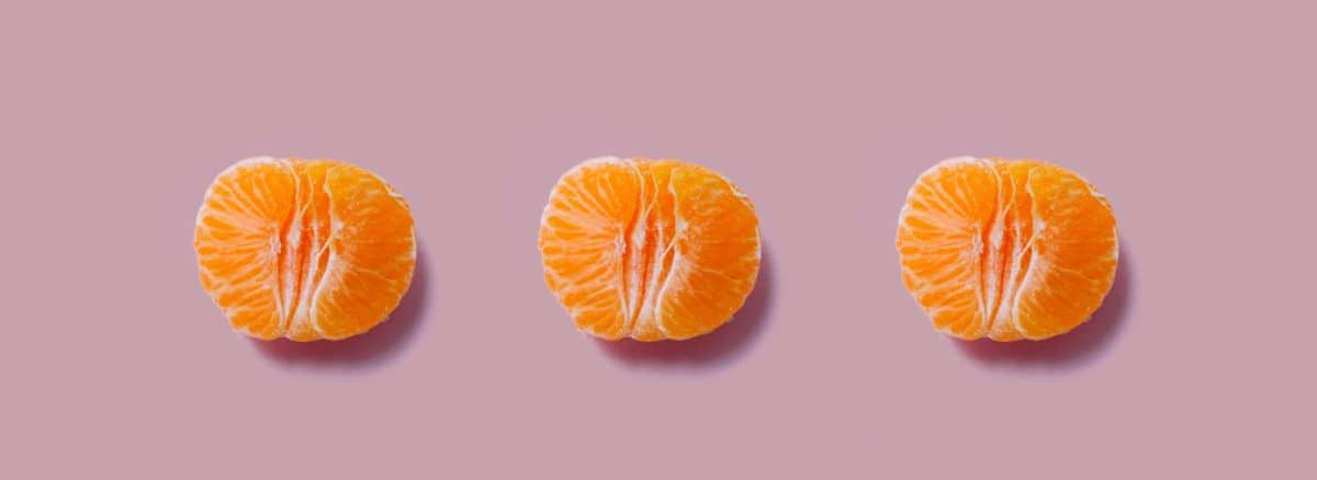 three orange fruits